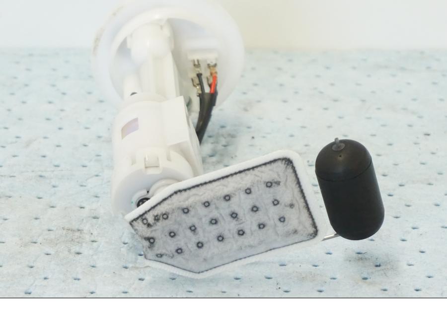 Snett uppifrån på Bensinpump insprut från en Yamaha X-Max 250 -2016 scooter.