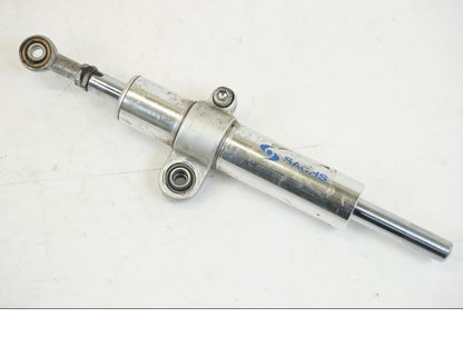 Framsidan på Styrdämpare från en Aprilia Tuono V4R -2011 motorcykel.