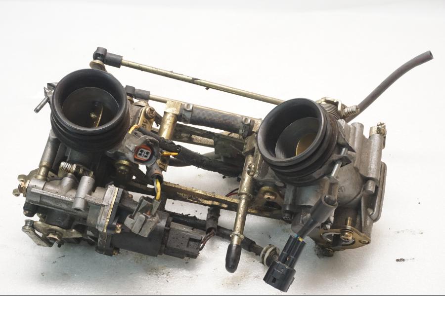 Framsidan på Spjällhus från en Suzuki SV 650 -2006 motorcykel.