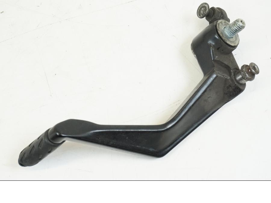 Snett uppifrån på Bromspedal från en Ducati Streetfighter S -2011 motorcykel.