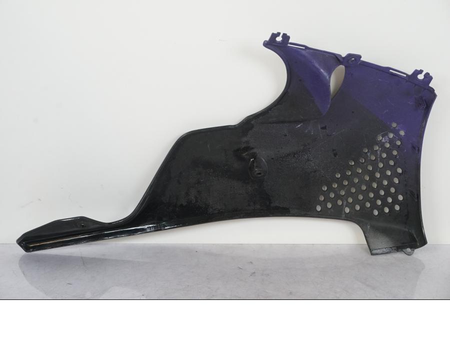 Vänster sida på Magkåpa från en Honda CBR 900 RR -1995 motorcykel.