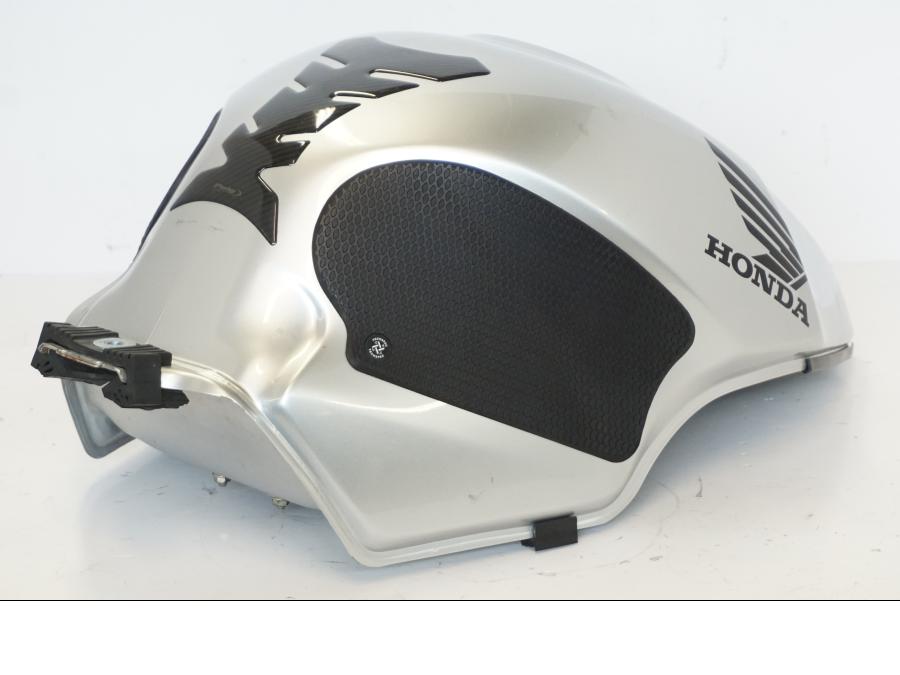 Vänster sida på Bensintank från en Honda CBR 900 RR -2001 motorcykel.