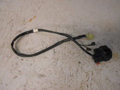 Framsidan på Styrelreglage från en Honda CBR 125 R -2006 motorcykel.