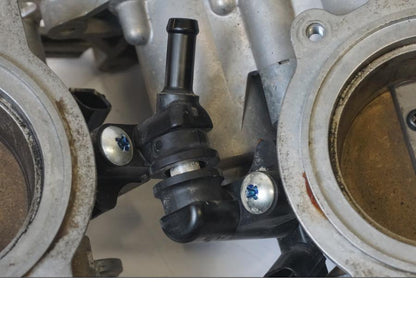 Baksidan på Spjällhus från en KTM 1190 Adventure -2015 motorcykel.