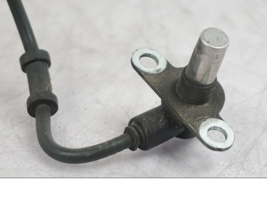 Snett uppifrån på ABS givare från en Triumph Tiger -2009 motorcykel.