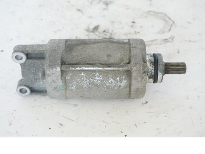 Höger sida på Startmotor från en Honda SH 300 A -2011 scooter.