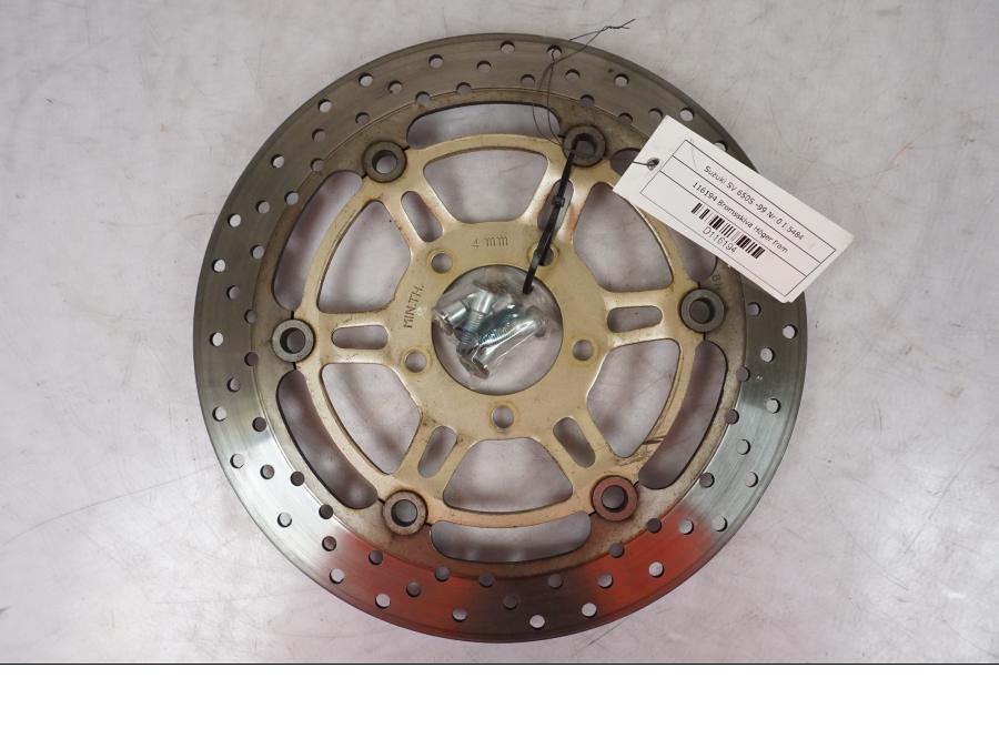 Framsidan på Bromsskiva från en Suzuki SV 650 -1999 motorcykel.