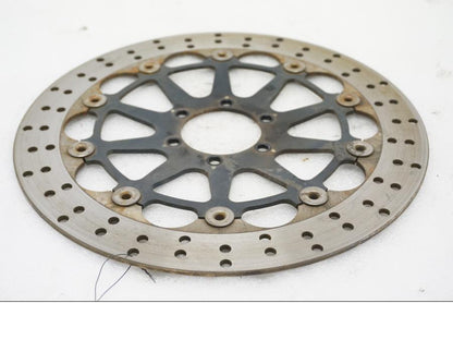 Framsidan på Bromsskiva från en Ducati Monster 696 -2010 motorcykel.