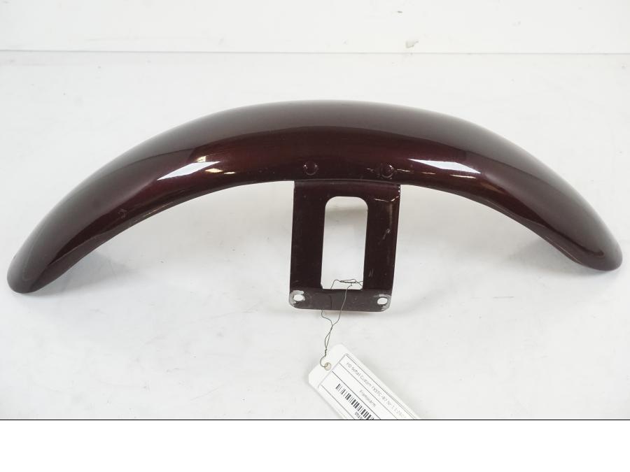 Baksidan på <p>Framskärm från HD Softail Custom FXSTC 1987.</p>

<p>Repor samt mindre slitage av lack se bilder.</p> motorcykel.