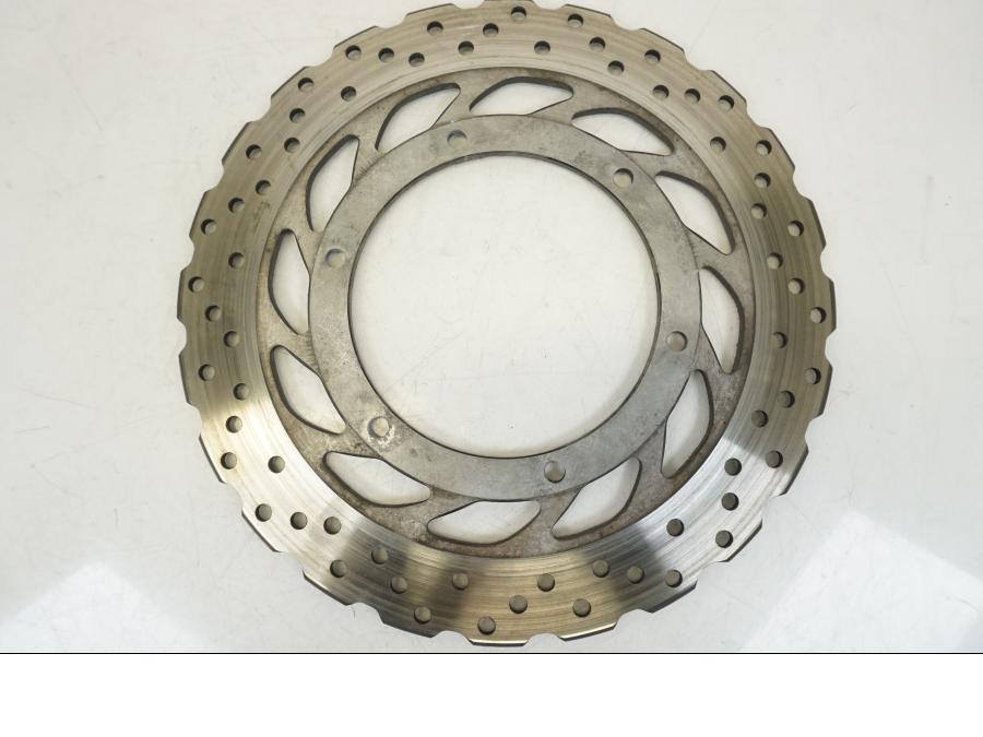 Framsidan på Bromsskiva från en Yamaha XT 1200 A -2010 motorcykel.