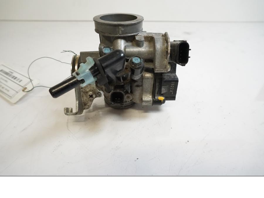 Höger sida på Spjällhus från en Honda CBR 125 R -2011 motorcykel.