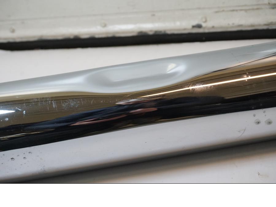 Vänster sida på Ljuddämpare från en H-D Street Glide FLHX -2015 motorcykel.