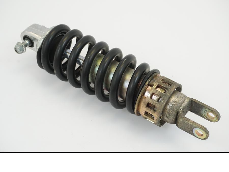 Höger sida på <p>Stötdämpare från Suzuki GSX-R 600 Corona 2000.</p>

<p>Okej skick, justerbar. C/C mått: ca 300mm.</p> motorcykel.