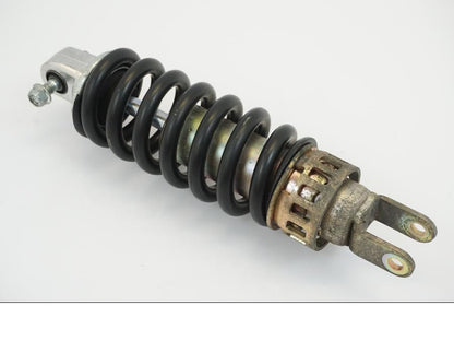 Höger sida på <p>Stötdämpare från Suzuki GSX-R 600 Corona 2000.</p>

<p>Okej skick, justerbar. C/C mått: ca 300mm.</p> motorcykel.