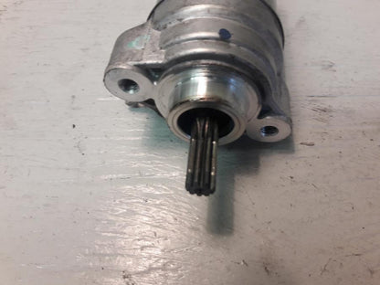 Baksidan på Startmotor från en Yamaha WR 125 -2010 motorcykel.