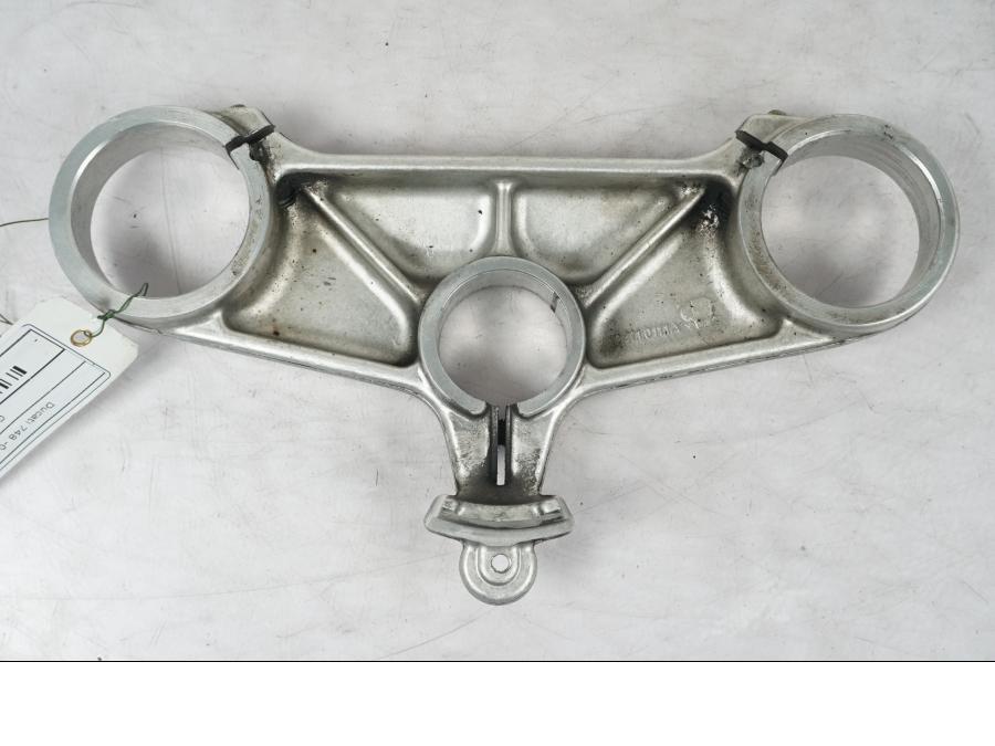 Vänster sida på Gaffelkrona från en Ducati 748 -2002 motorcykel.