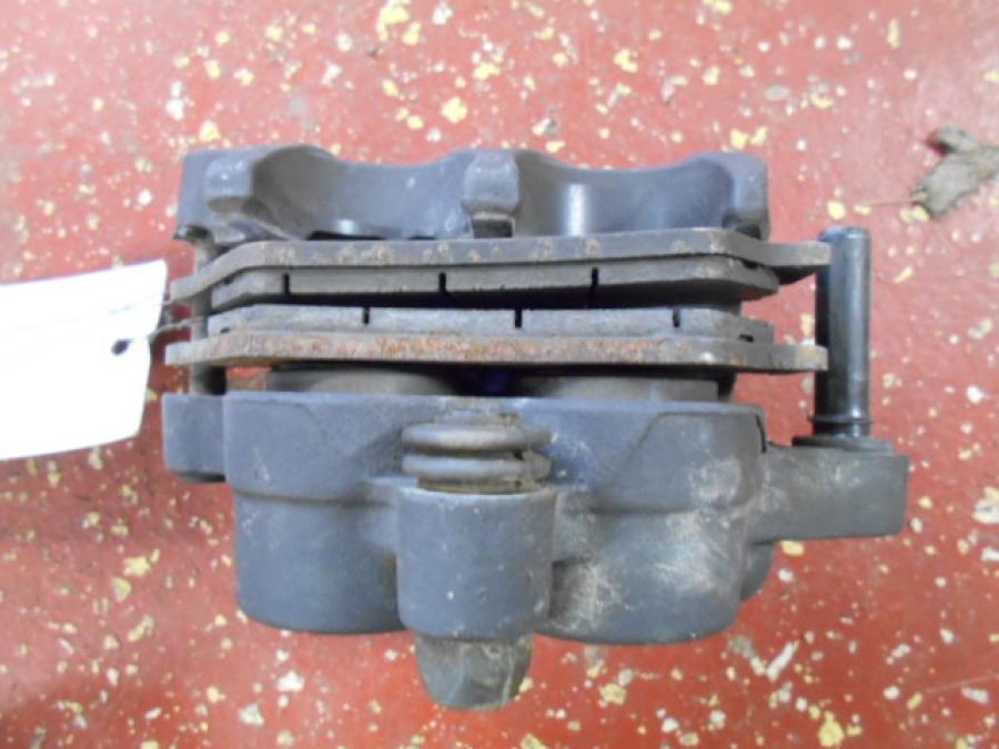 Vänster sida på Bromsok från en Husqvarna TR 650 Strada -2012 motorcykel.