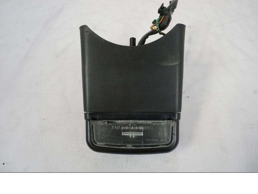 Vänster sida på Skyltbelysning från en Honda CBR 125 R -2006 motorcykel.