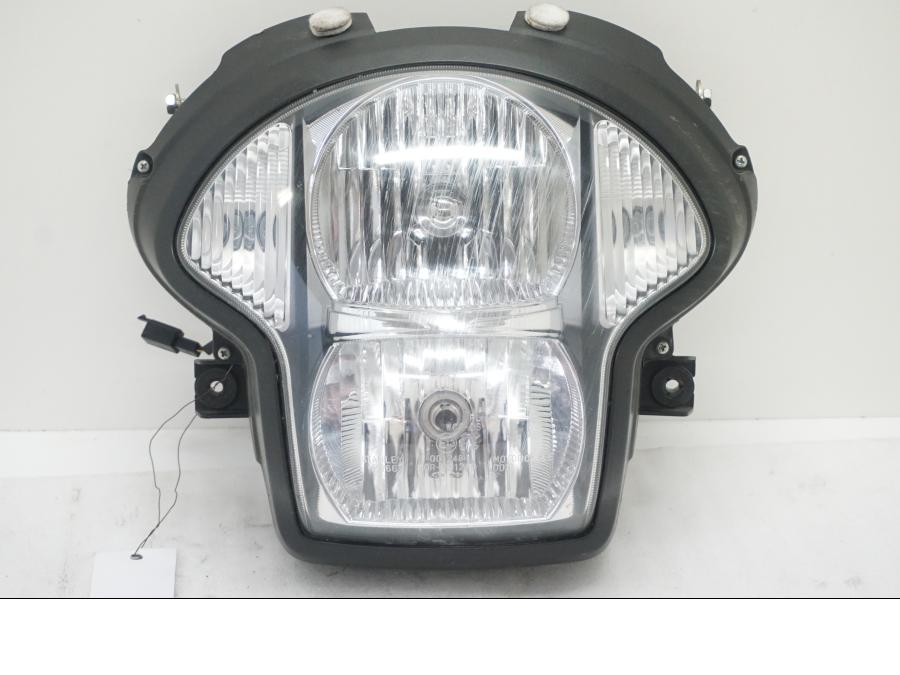 Baksidan på Strålkastare från en Kawasaki Versys 650 -2008 motorcykel.