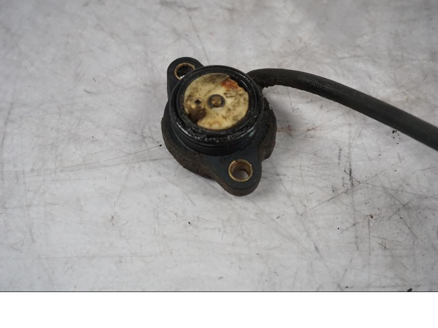 Baksidan på Växelindikator från en Triumph Tiger Explorer -2016 motorcykel.