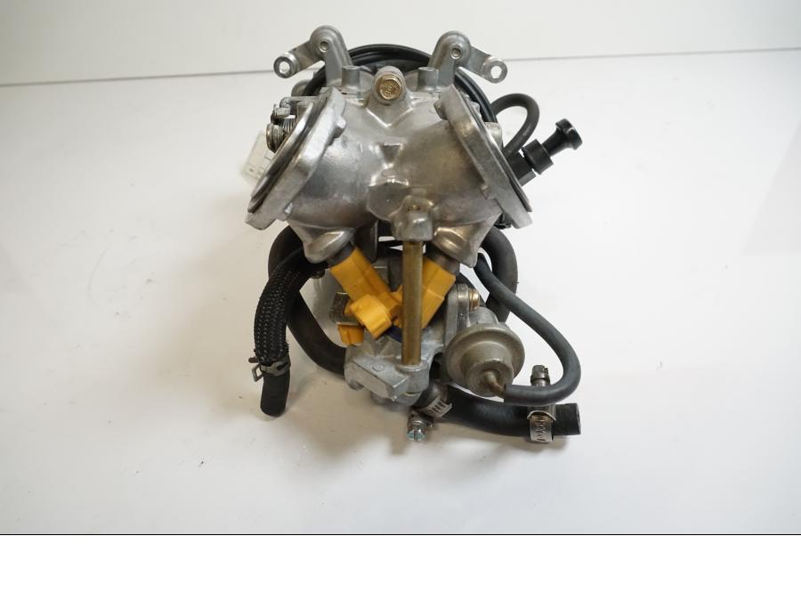 Vänster sida på Spjällhus från en Kawasaki VN 1600 Mean Streak -2004 motorcykel.