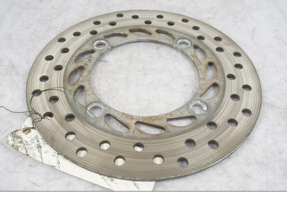 Höger sida på Bromsskiva från en Honda CBR 125 R -2004 motorcykel.