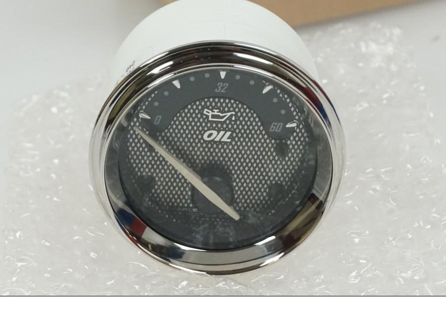 Baksidan på Oljetrycksmätare från en H-D Street Glide CVO FLHXSE -2012 motorcykel.