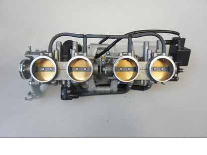 Höger sida på Spjällhus från en Suzuki GSX-R 1000 -2013 motorcykel.