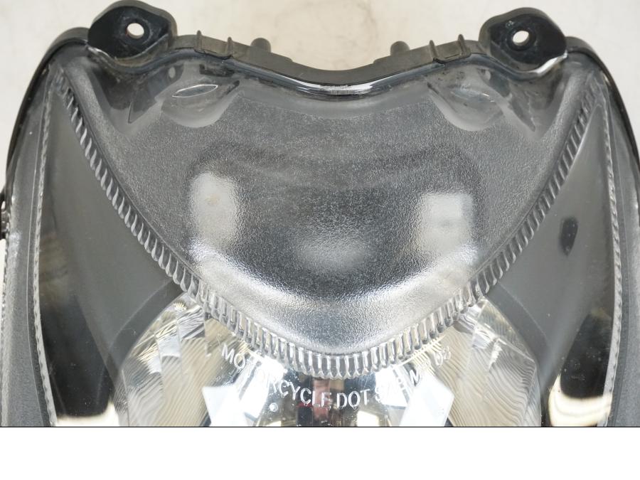 Vänster sida på Strålkastare från en Ducati Streetfighter S -2011 motorcykel.