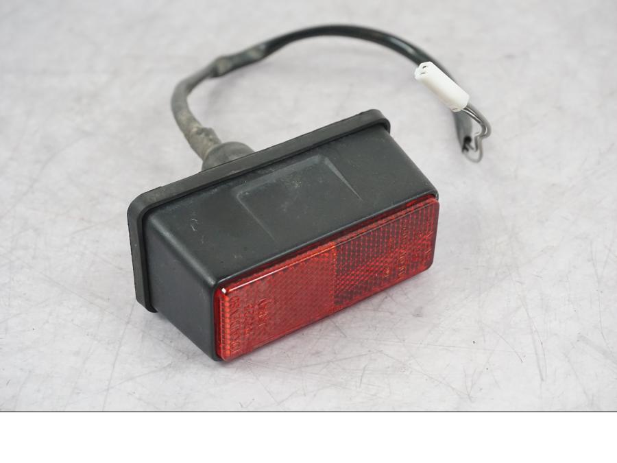 Framsidan på Skyltbelysning från en Suzuki GSF 1250 -2010 motorcykel.