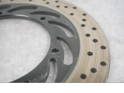 Vänster sida på Bromsskiva från en Yamaha XVS 1100 -2003 motorcykel.