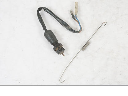 Framsidan på Bromsljuskontakt från en Kawasaki KL 650A -1987 motorcykel.