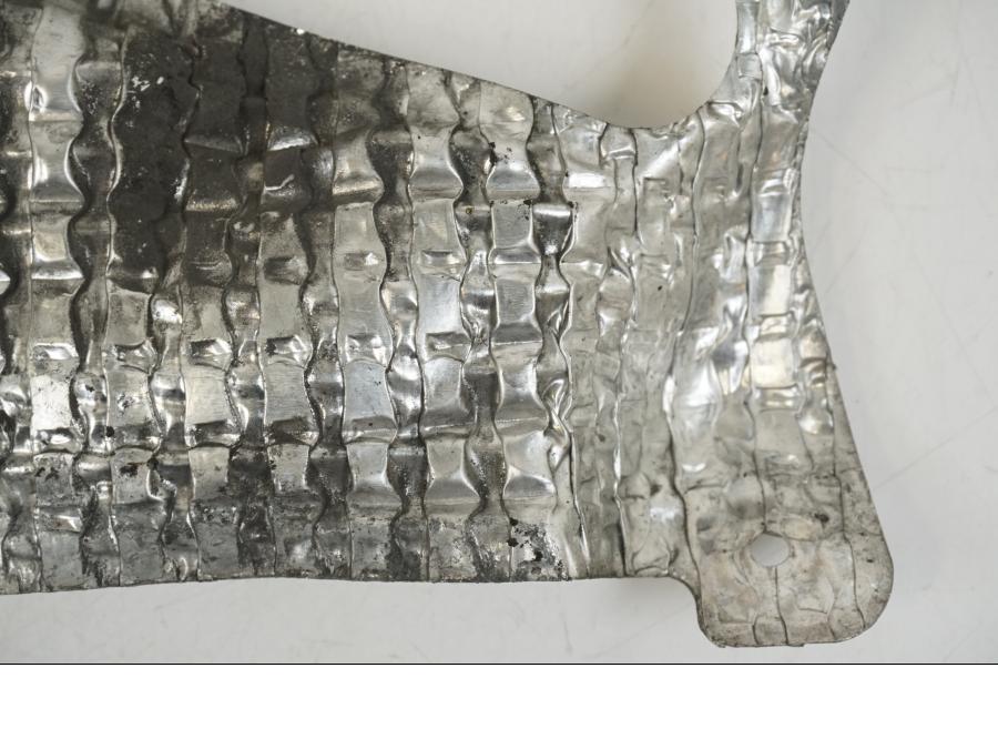 Baksidan på Värmeskydd från en Suzuki GSX-R 1000 -2007 motorcykel.