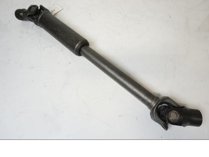 Framsidan på <p>Kardanaxel från Triumph Tiger Explorer 2010.</p>

<p>Med låsring.</p> motorcykel.