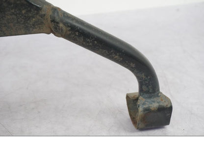 Vänster sida på Centralstöd från en Suzuki GSF 1250 -2010 motorcykel.