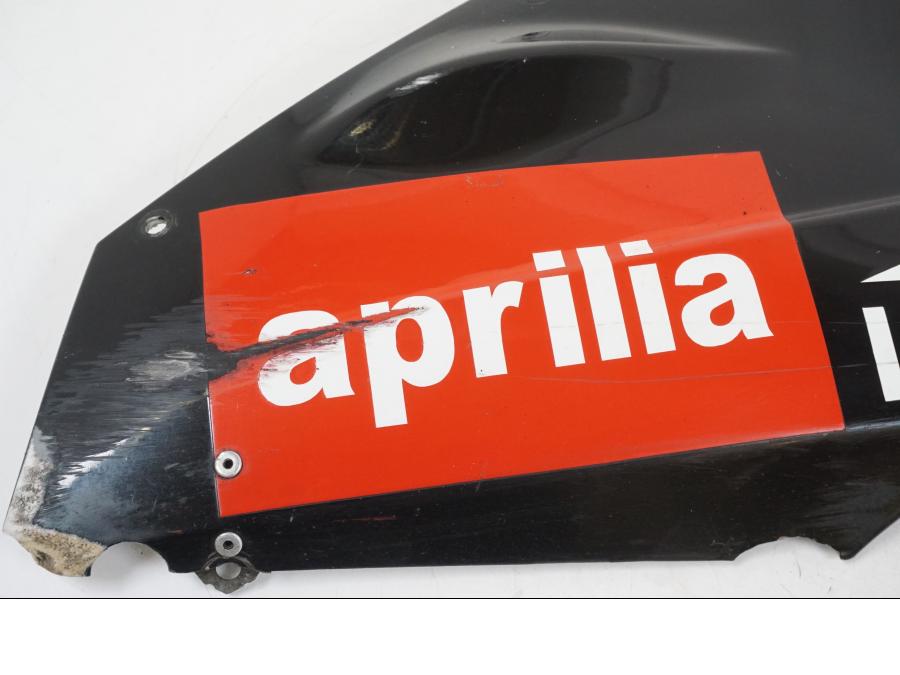 Baksidan på Magkåpa från en Aprilia RS 125 -2008 motorcykel.