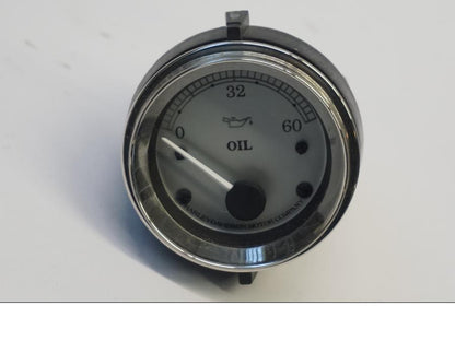 Framsidan på Oljetrycksmätare från en H-D Street Glide FLHX -2013 motorcykel.