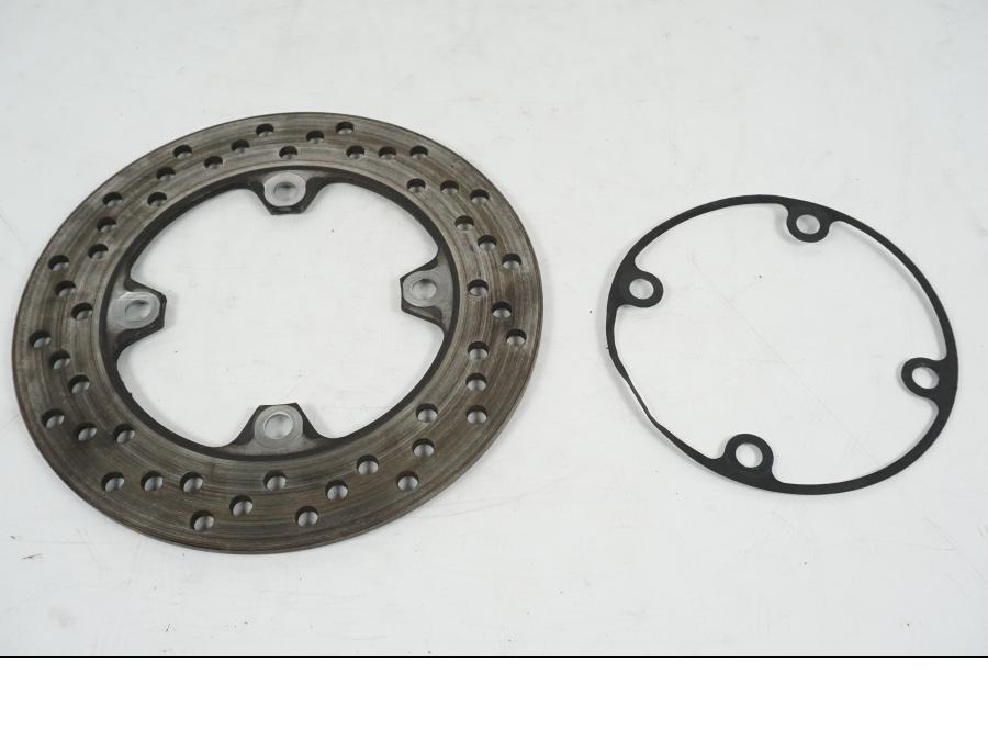 Framsidan på Bromsskiva från en Kawasaki Z 750 -2006 motorcykel.