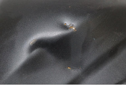 Baksidan på <p>Bensintank från Yamaha XT 660 X 2008.</p>

<p>Bucklig, ytrost och lackskador se bilder.</p> motorcykel.