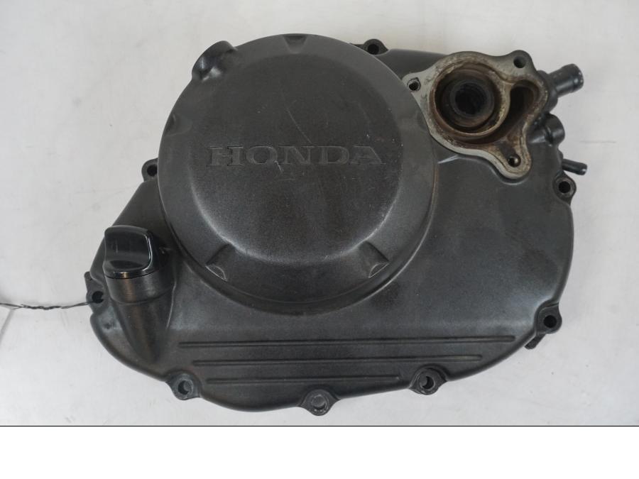 Framsidan på Kopplingskåpa från en Honda CBR 125 R -2006 motorcykel.
