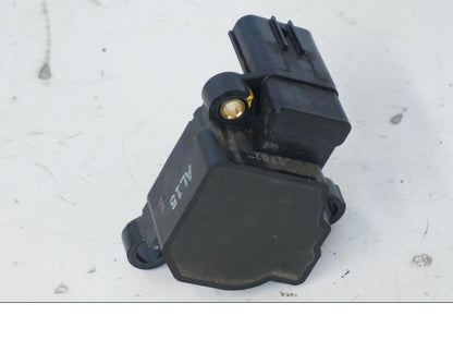 Baksidan på TPS från en Honda SH 300 A -2011 scooter.