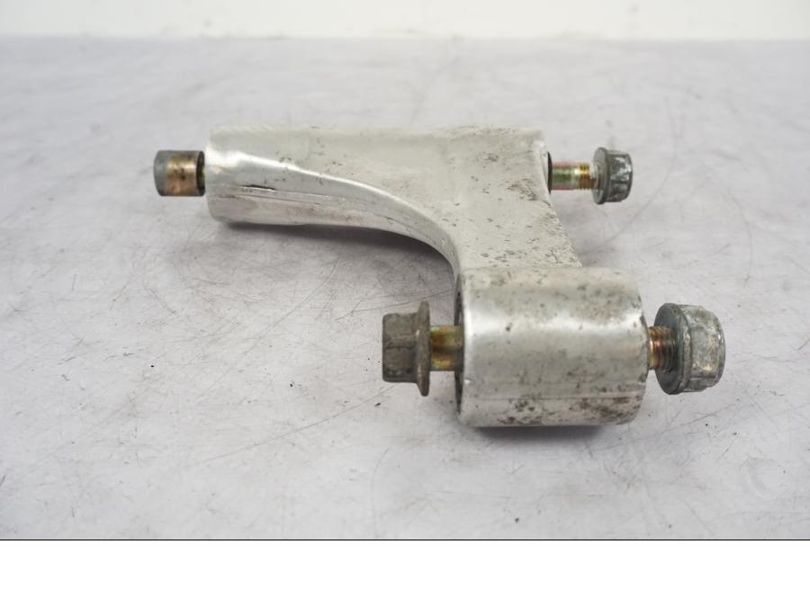 Vänster sida på Länkarm från en Honda VTR 1000 F -1997 motorcykel.