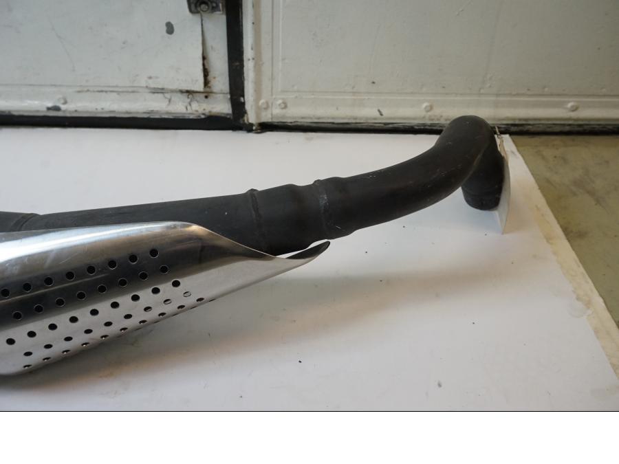 Vänster sida på Ljuddämpare från en Honda CB 600 Hornet -2007 motorcykel.