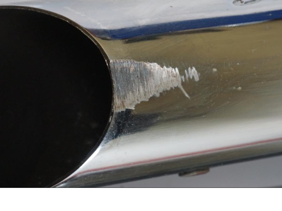 Snett nerifrån på Ljuddämpare Sport från en H-D Fat Boy -2006 motorcykel.