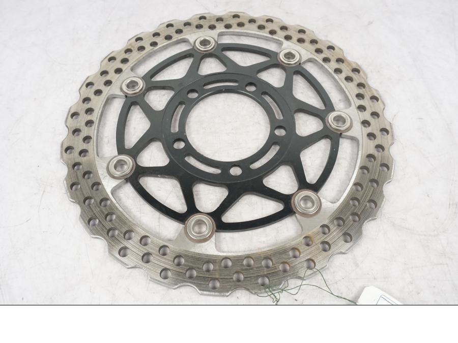 Framsidan på Bromsskiva från en Kawasaki ZZ-R 1400 -2010 motorcykel.