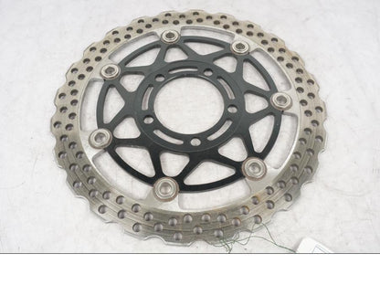 Framsidan på Bromsskiva från en Kawasaki ZZ-R 1400 -2010 motorcykel.