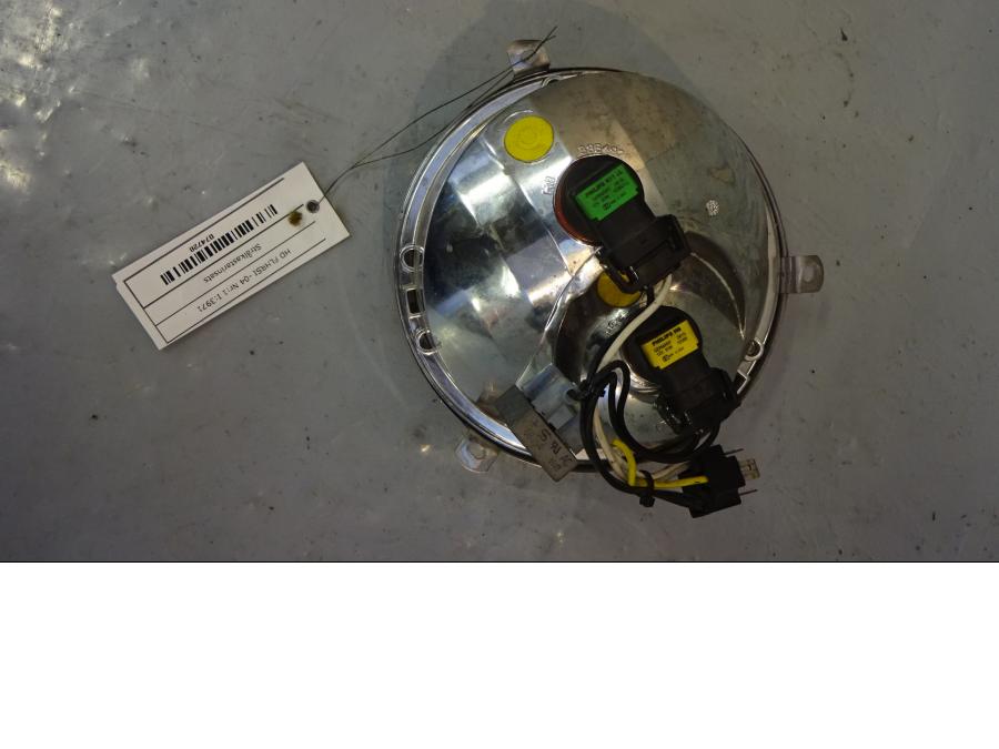 Baksidan på Strålkastarinsats från en H-D Touring Road King Custom FLHRSI -2004 motorcykel.