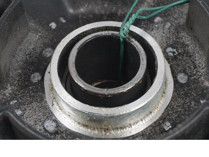 Snett uppifrån på Drevfäste från en Suzuki GSF 1250 -2010 motorcykel.