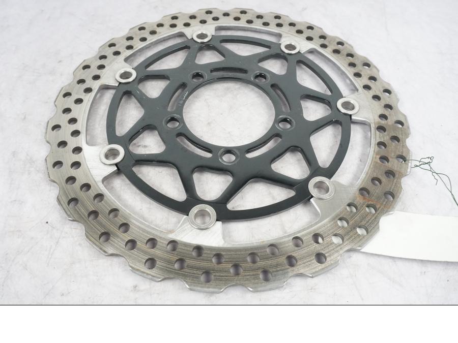Höger sida på Bromsskiva från en Kawasaki ZZ-R 1400 -2010 motorcykel.