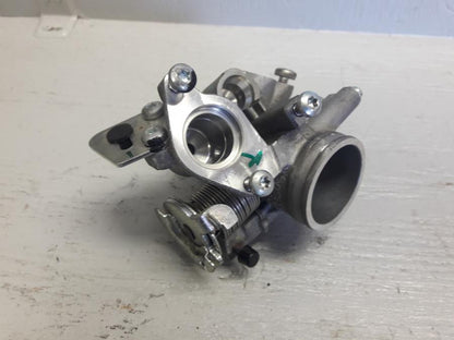 Framsidan på Spjällhus från en KTM 125 Duke -2017 motorcykel.